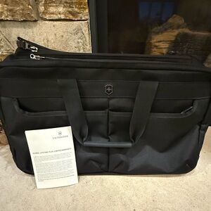 Victorinox Werks Traveller 5.0 Duffel Laptop Cargo Bag Black Canvas Pocket